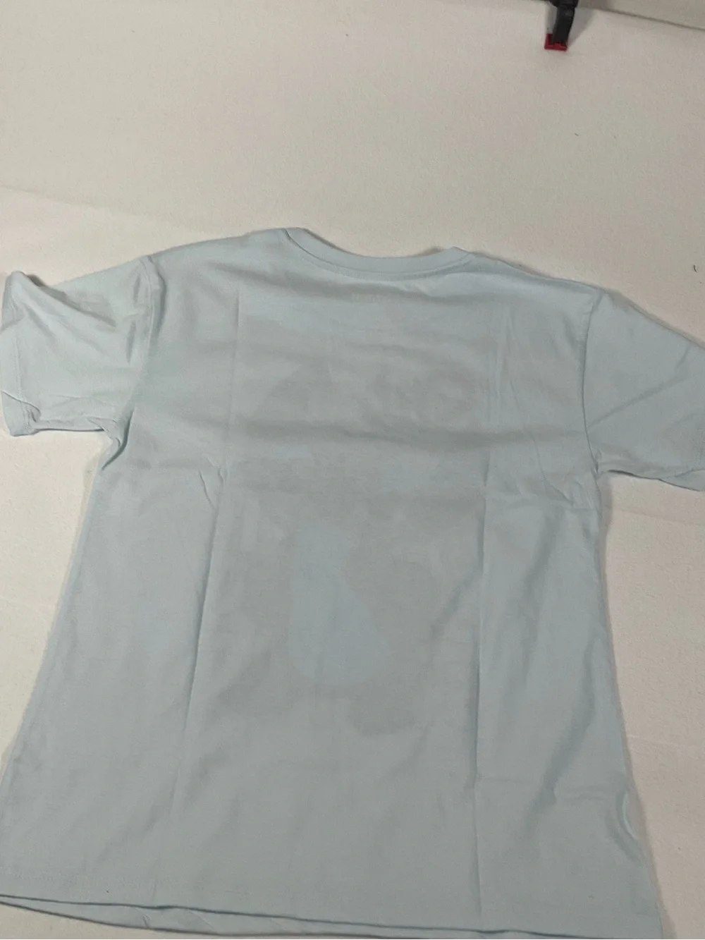 Disney Light Blue Stitch Tee with Pink and Purple. New with Tag.size L(10/12)